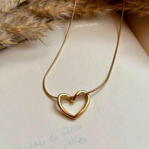 480894011_17893159821175732_6741296131587562529_n Golden Heart Knot Necklace