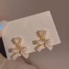 51HS7gXvrjL._SY695 Pearl Enamel Bow Earrings