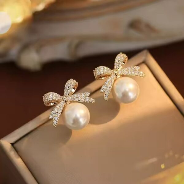 pearl bow earrings Pearl Bow Earrings