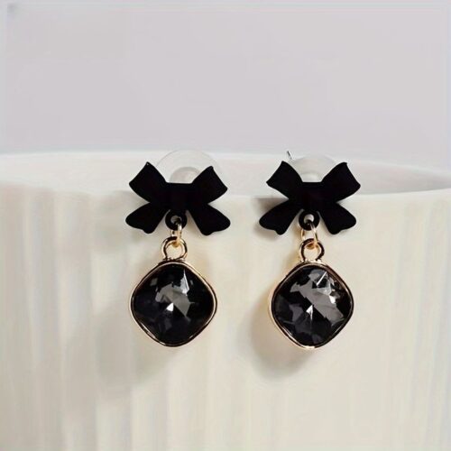 black bow stone earrings